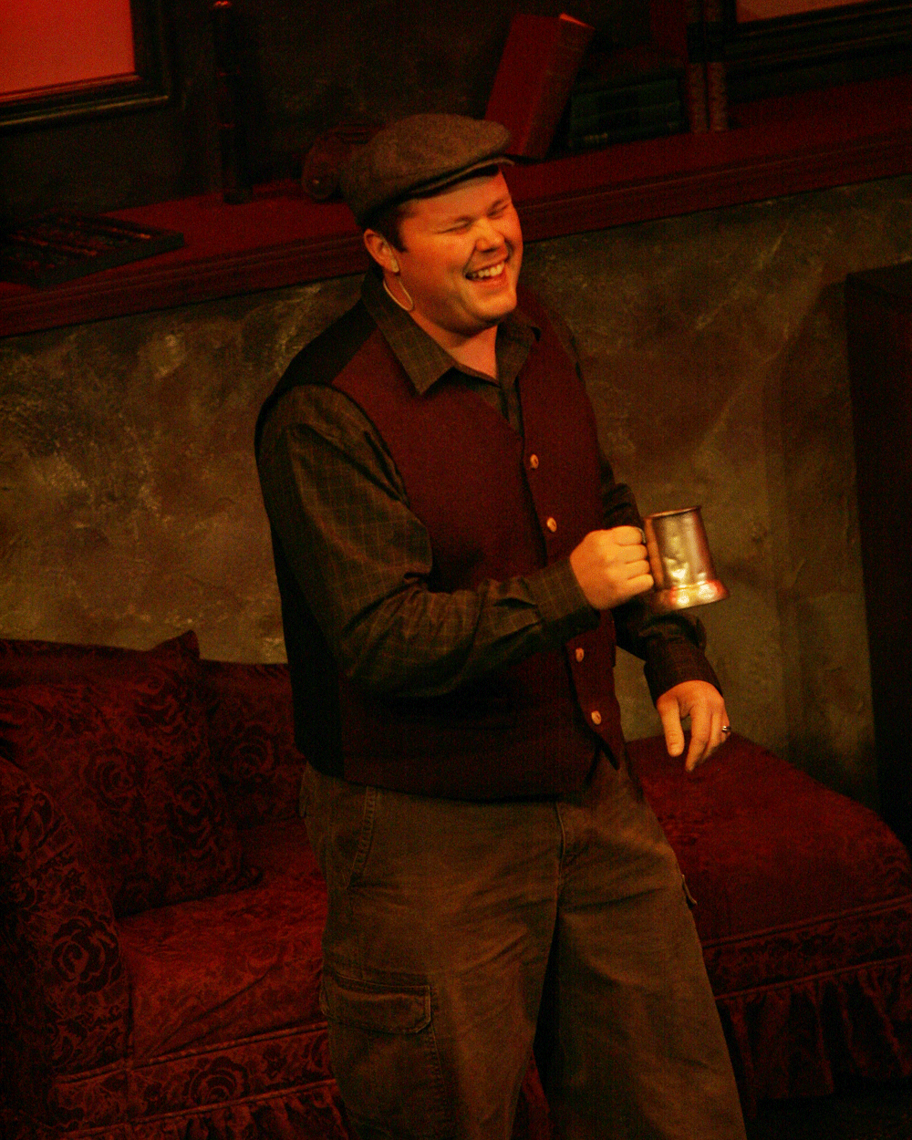 Troy Bashor performing onstage as a vocalist and actor